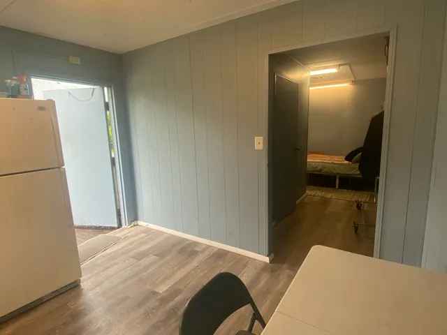 a bedroom with a bed and walk in closet