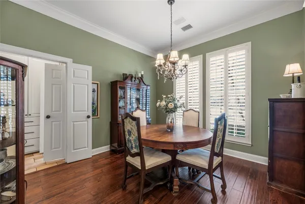a kitchen with granite countertop cabinets and window
