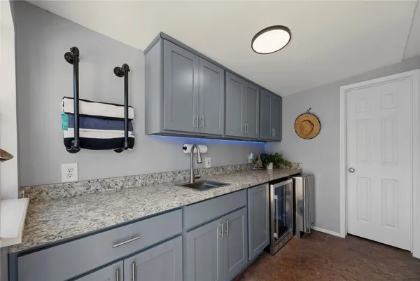 front view of a house with a swimming pool