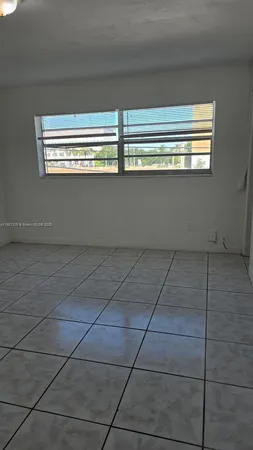 a close view of appliances and cabinets in a room