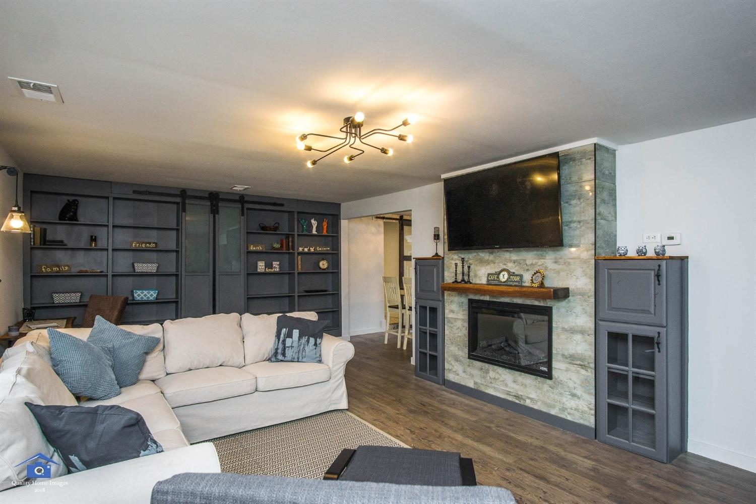 10807 Porter Street Crown Point, IN 46307 - Photo 3 of 10 a living room with furniture and a flat screen tv