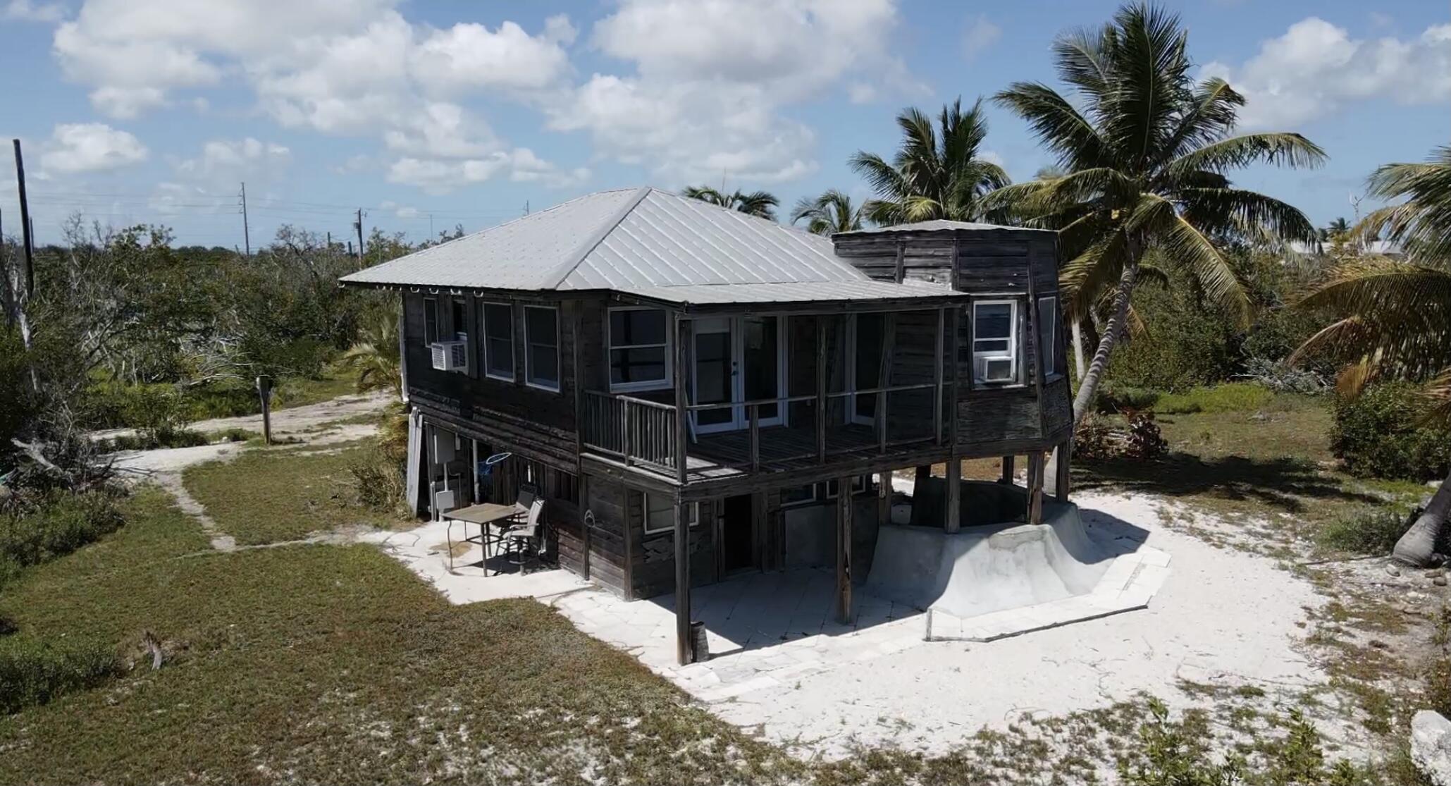 31625 Warner Street Big Pine Key, FL 33043 - Photo 12 of 30 a view of a backyard with sitting area