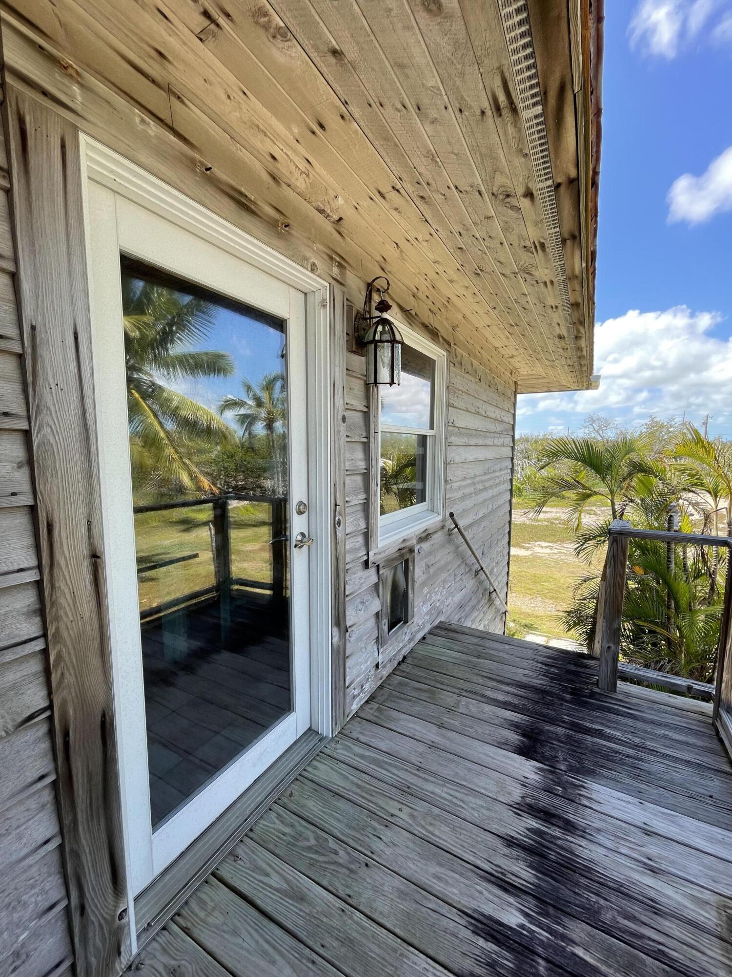 31625 Warner Street Big Pine Key, FL 33043 - Photo 14 of 30 a view of hallway with wooden floor