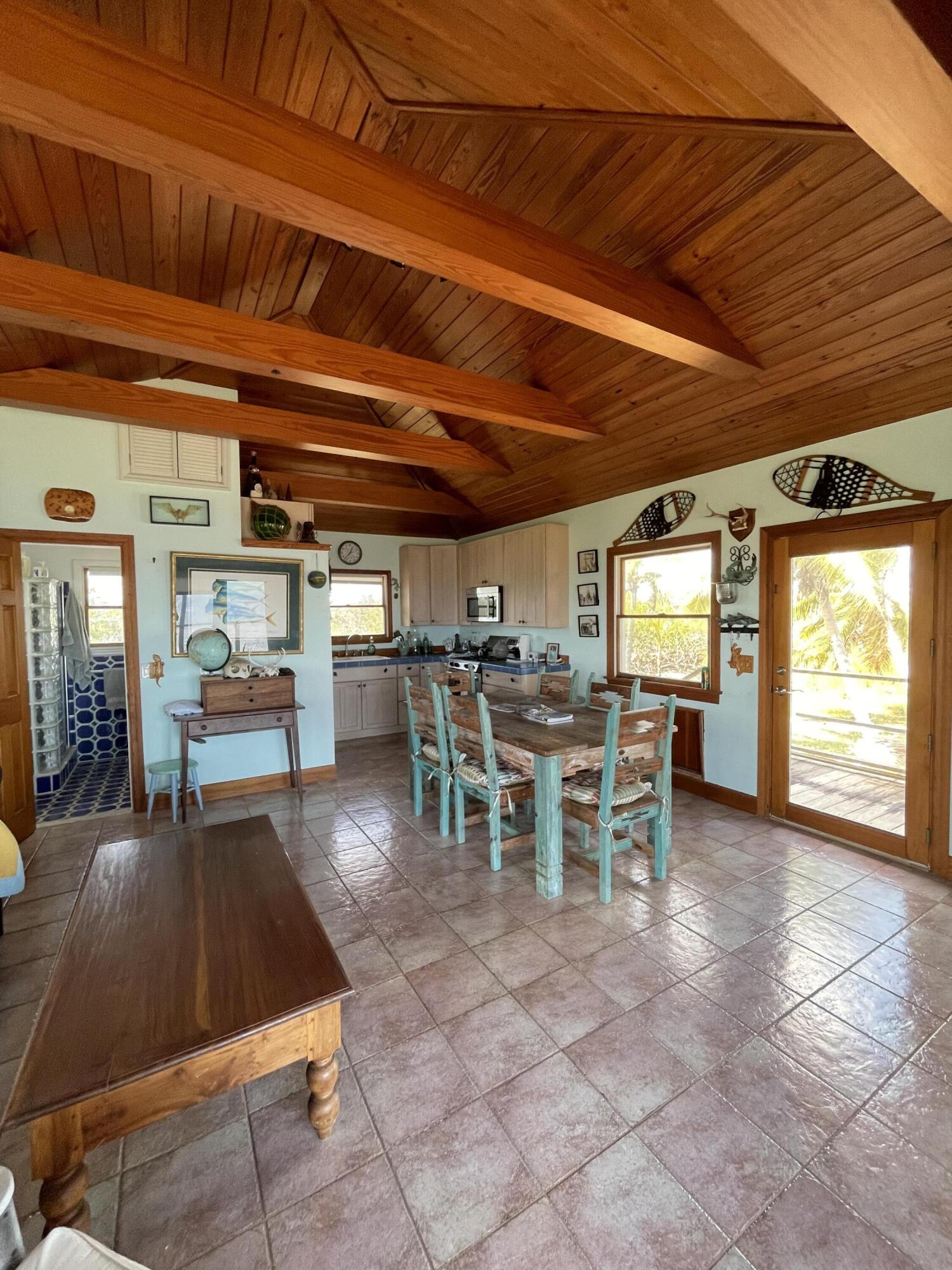 31625 Warner Street Big Pine Key, FL 33043 - Photo 18 of 30 a view of a patio with table and chairs