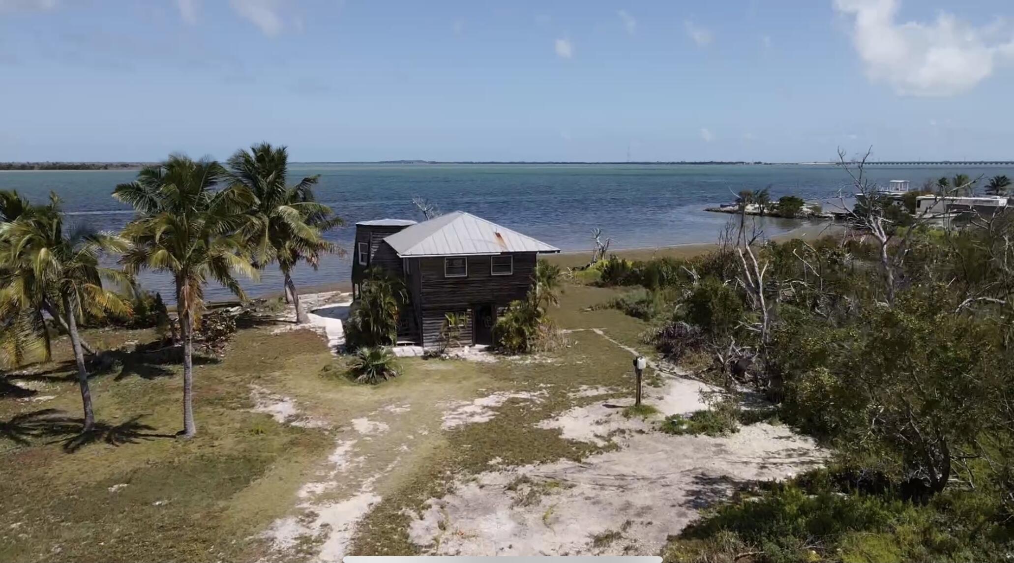 31625 Warner Street Big Pine Key, FL 33043 - Photo 4 of 30 a view of a terrace with chairs