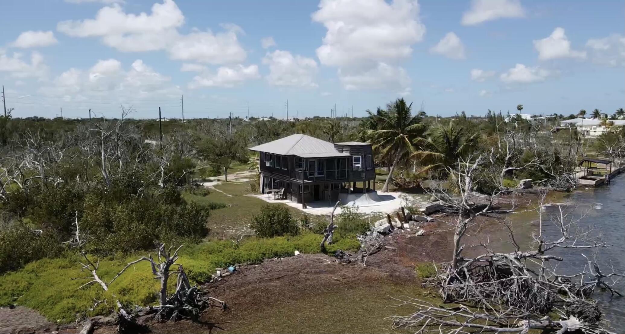 31625 Warner Street Big Pine Key, FL 33043 - Photo 8 of 30 a view of a lake with a yard