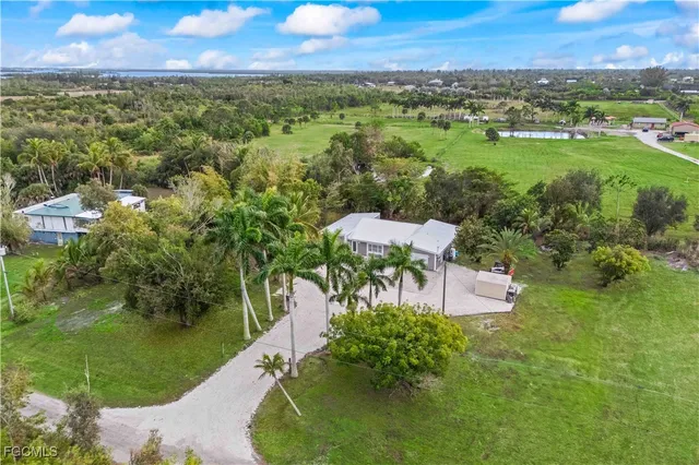 a view of a city with a building in the background