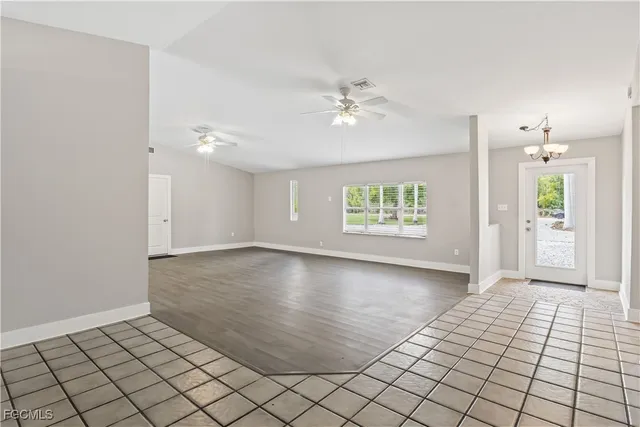 a view of an empty room and window