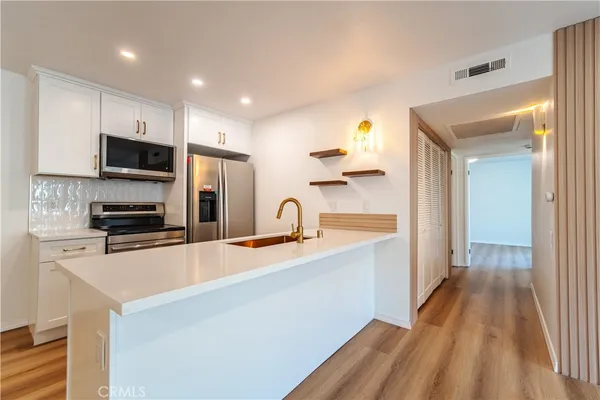 $539,000 | 21951 Rimhurst Drive, Unit 202, Lake Forest, CA 92630