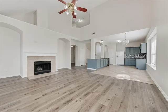 a kitchen with stainless steel appliances granite countertop a stove and a sink