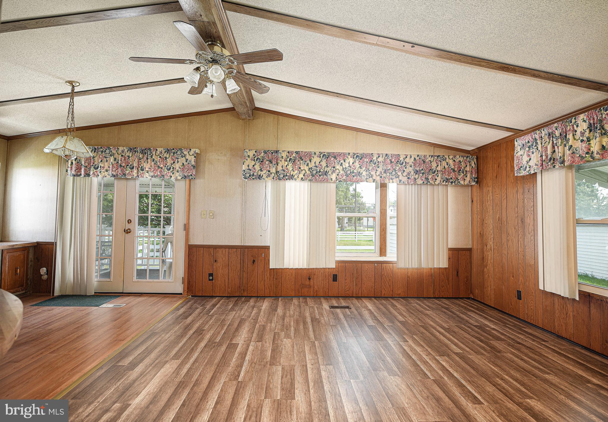 107 Lariat Road Middle River, MD 21220 - Photo 6 of 28 Living room w/access to the deck