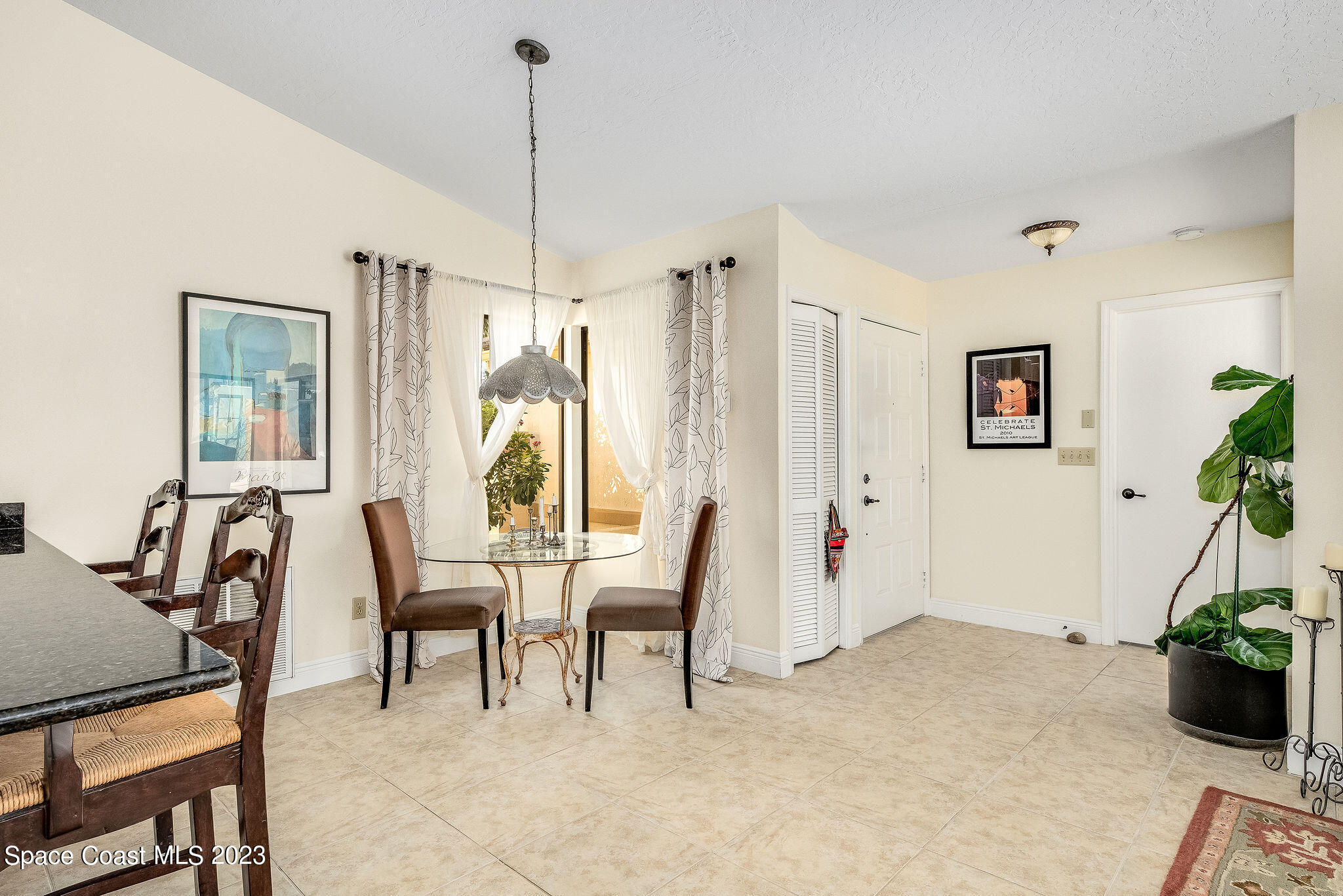 440 Maple Bluff Circle Melbourne, FL 32940 - Photo 14 of 92 a view of a livingroom with furniture window and wooden floor