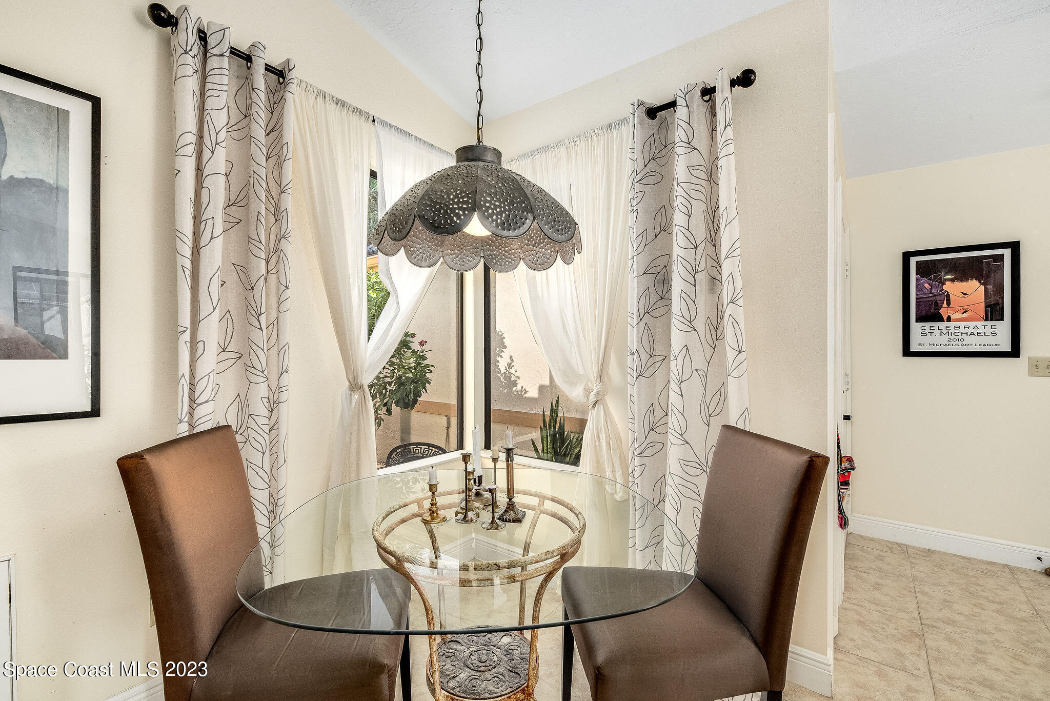 440 Maple Bluff Circle Melbourne, FL 32940 - Photo 17 of 92 a view of a dining room with furniture window and outside view