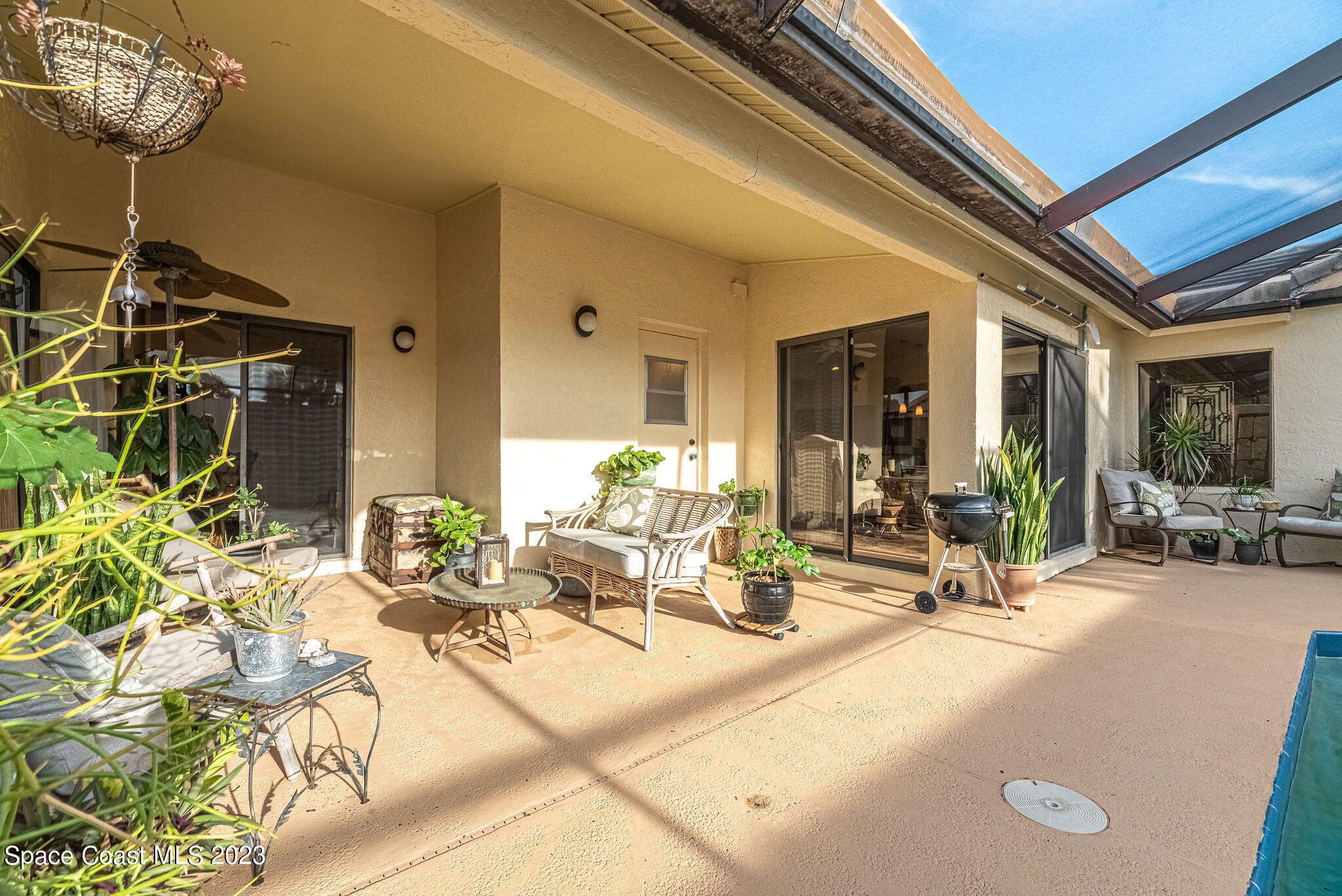 440 Maple Bluff Circle Melbourne, FL 32940 - Photo 40 of 92 a view of a lobby with furniture and floor to ceiling window