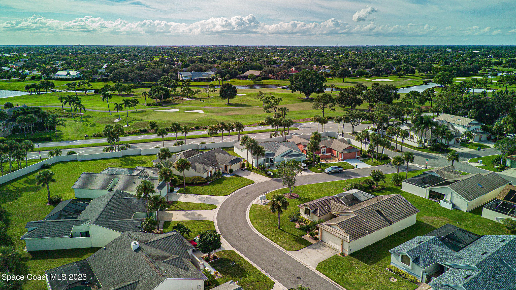 440 Maple Bluff Circle Melbourne, FL 32940 - Photo 49 of 92 an aerial view of a house with a garden