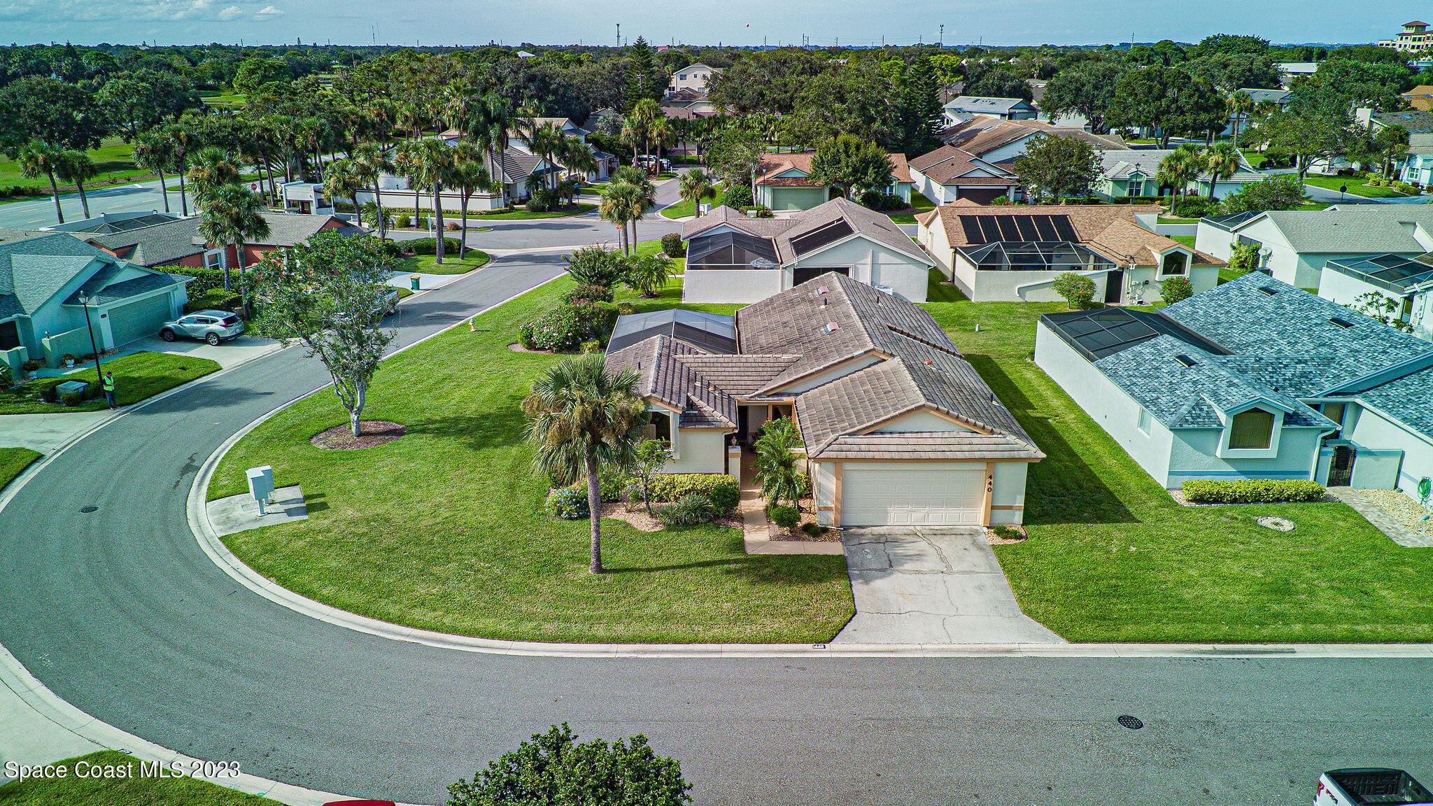 440 Maple Bluff Circle Melbourne, FL 32940 - Photo 5 of 92 an aerial view of a house with a yard and lake view