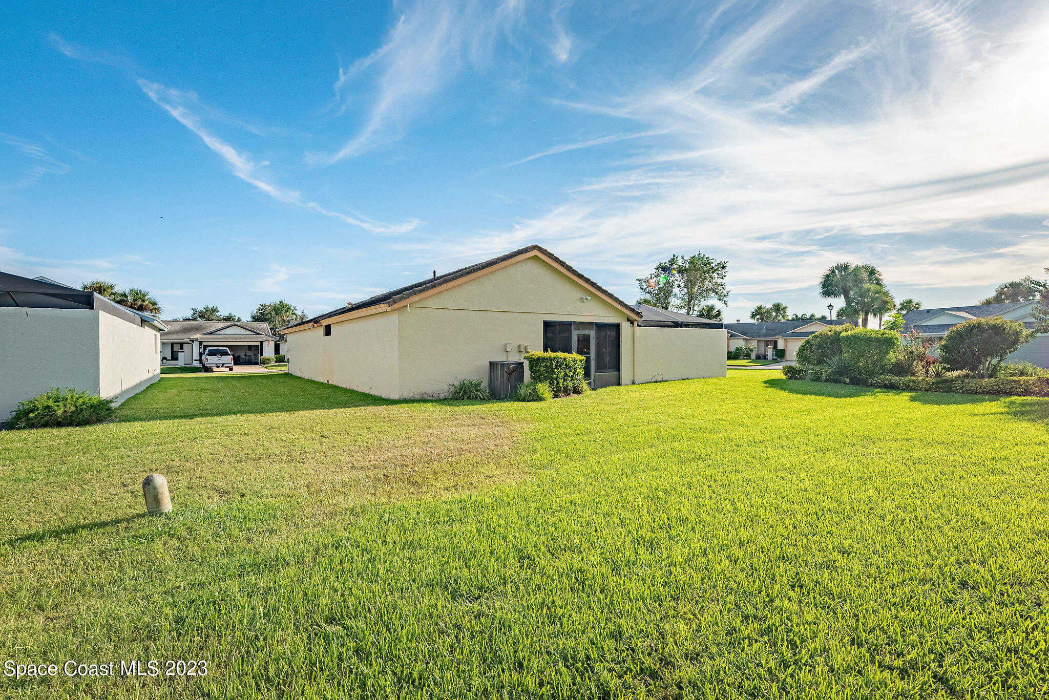 440 Maple Bluff Circle Melbourne, FL 32940 - Photo 91 of 92 a house view with swimming pool in front of it