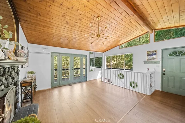 a view of livingroom with furniture and floor to ceiling window