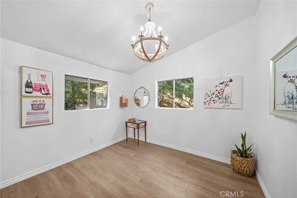 a view of a livingroom with shelves