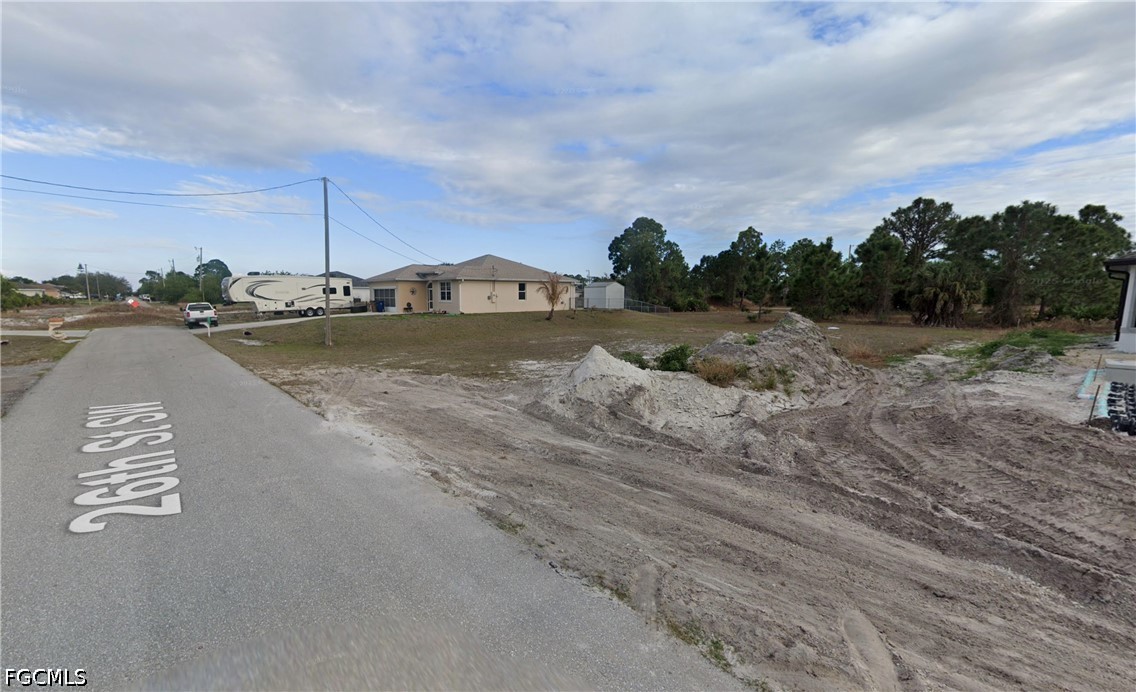 3503 26th Street Southwest Lehigh Acres, FL 33976 - Photo 2 of 9 a view of a city street view