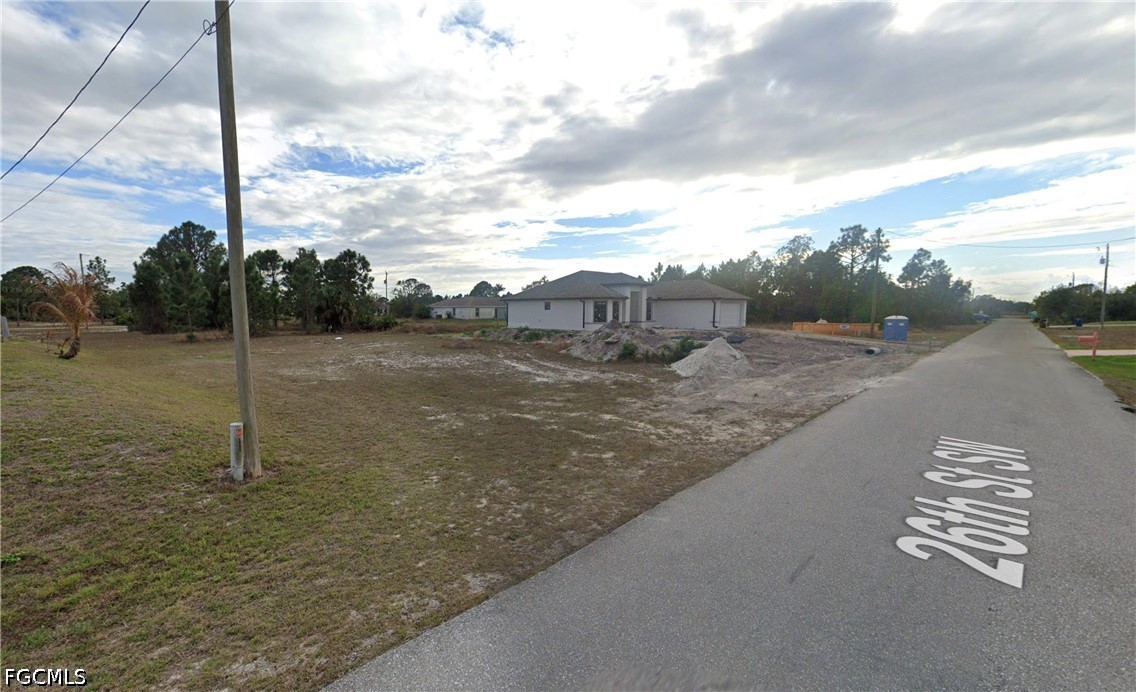 3503 26th Street Southwest Lehigh Acres, FL 33976 - Photo 3 of 9 a view of a road