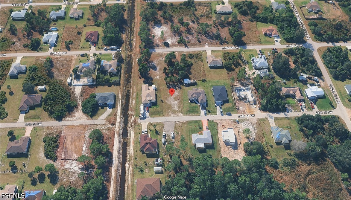 3503 26th Street Southwest Lehigh Acres, FL 33976 - Photo 5 of 9 an aerial view of multiple house