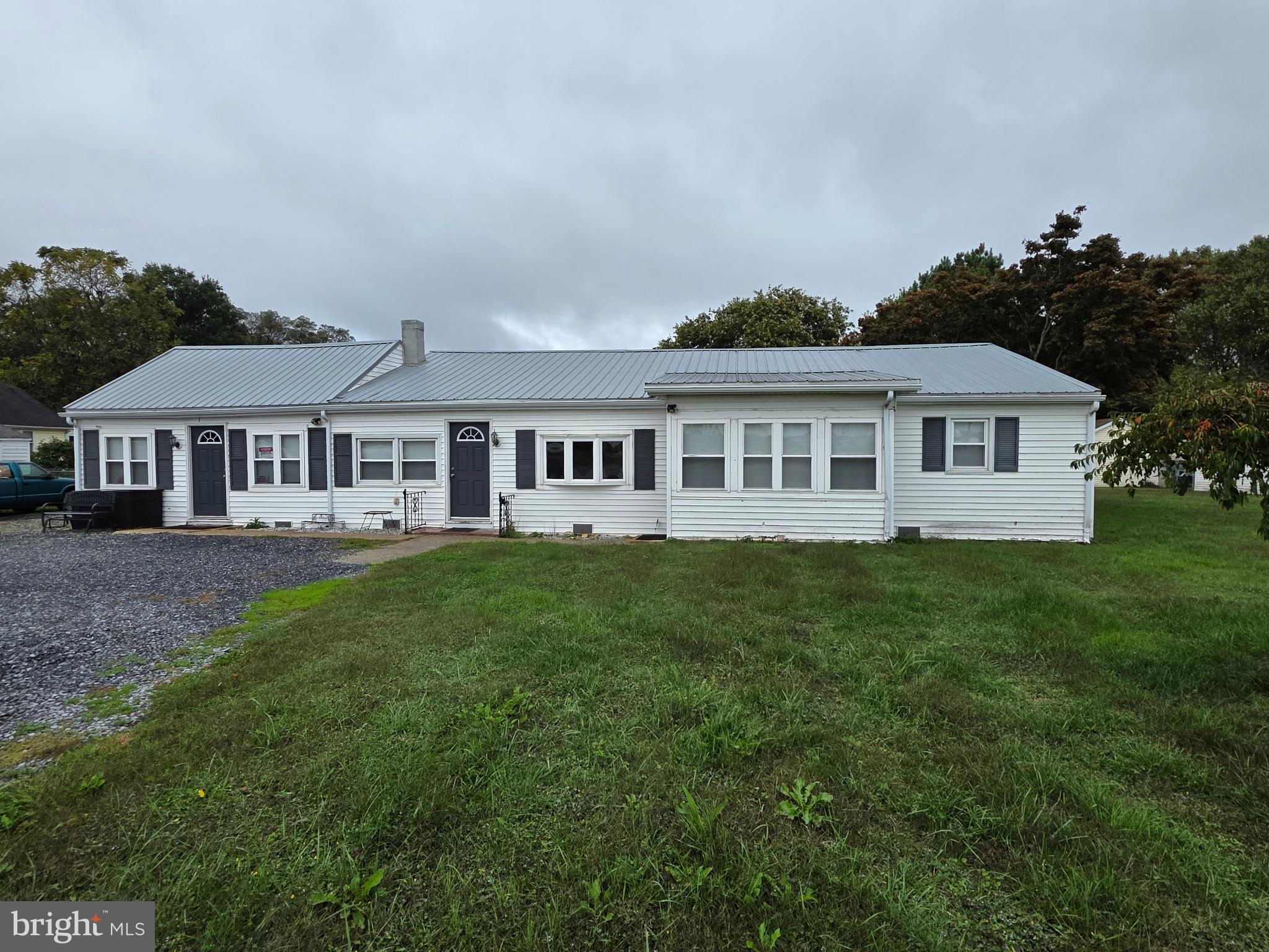 a view of a house with a garden view