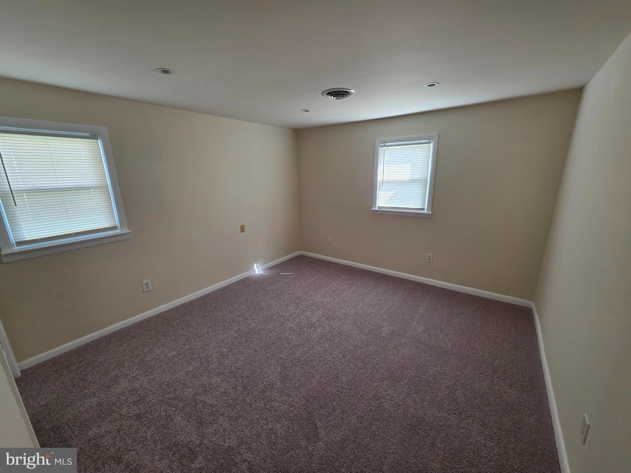 2318 Forrest Avenue Dover, DE 19904 - Photo 9 of 12 an empty room with a window