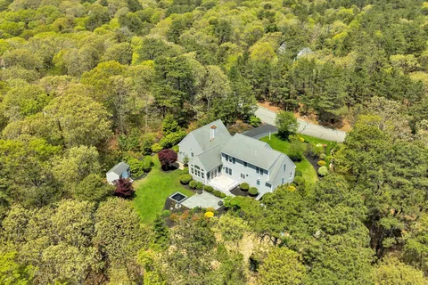 view of a house with a yard