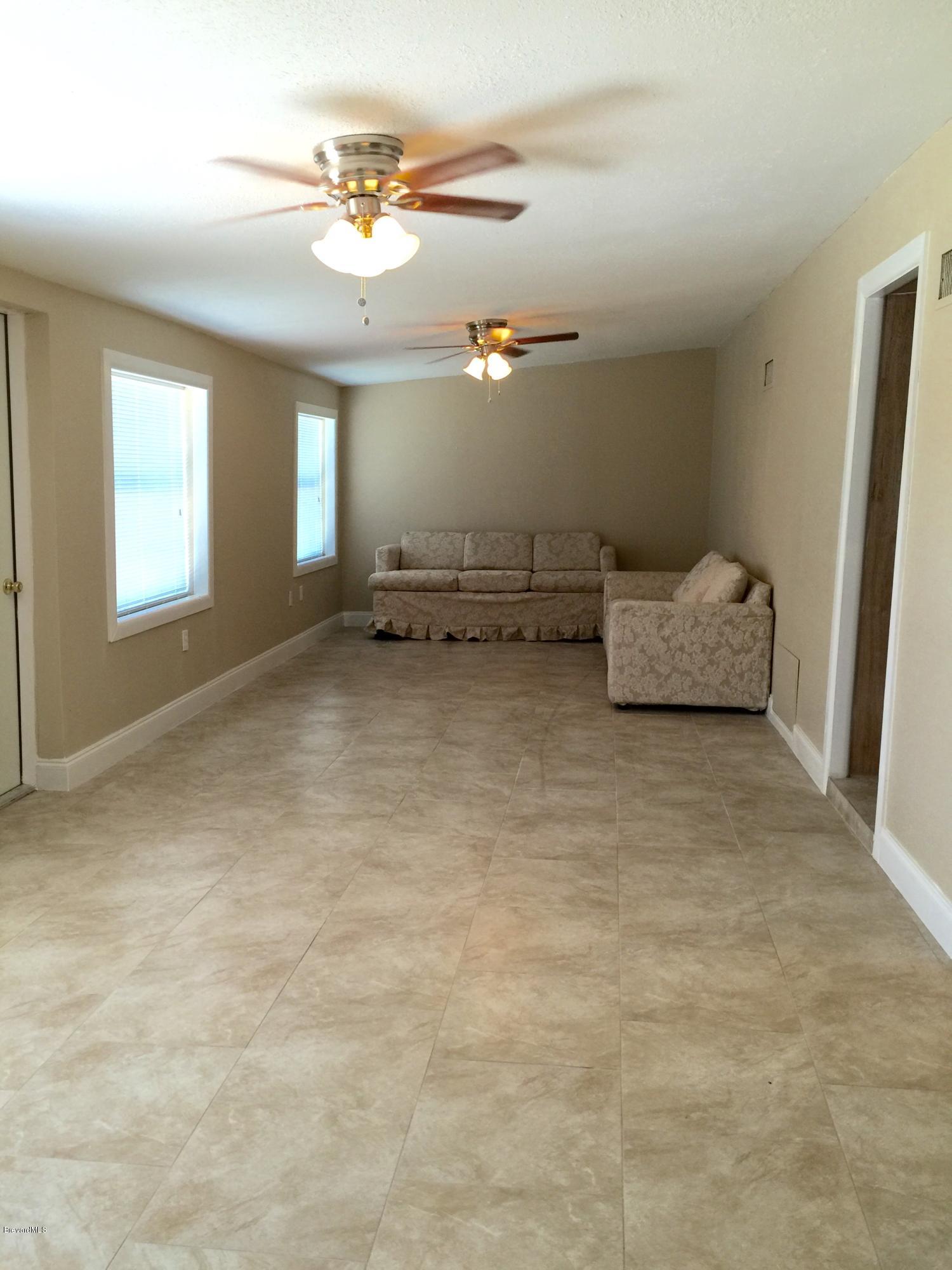 2192 Warwick Road Melbourne, FL 32935 - Photo 3 of 17 family room