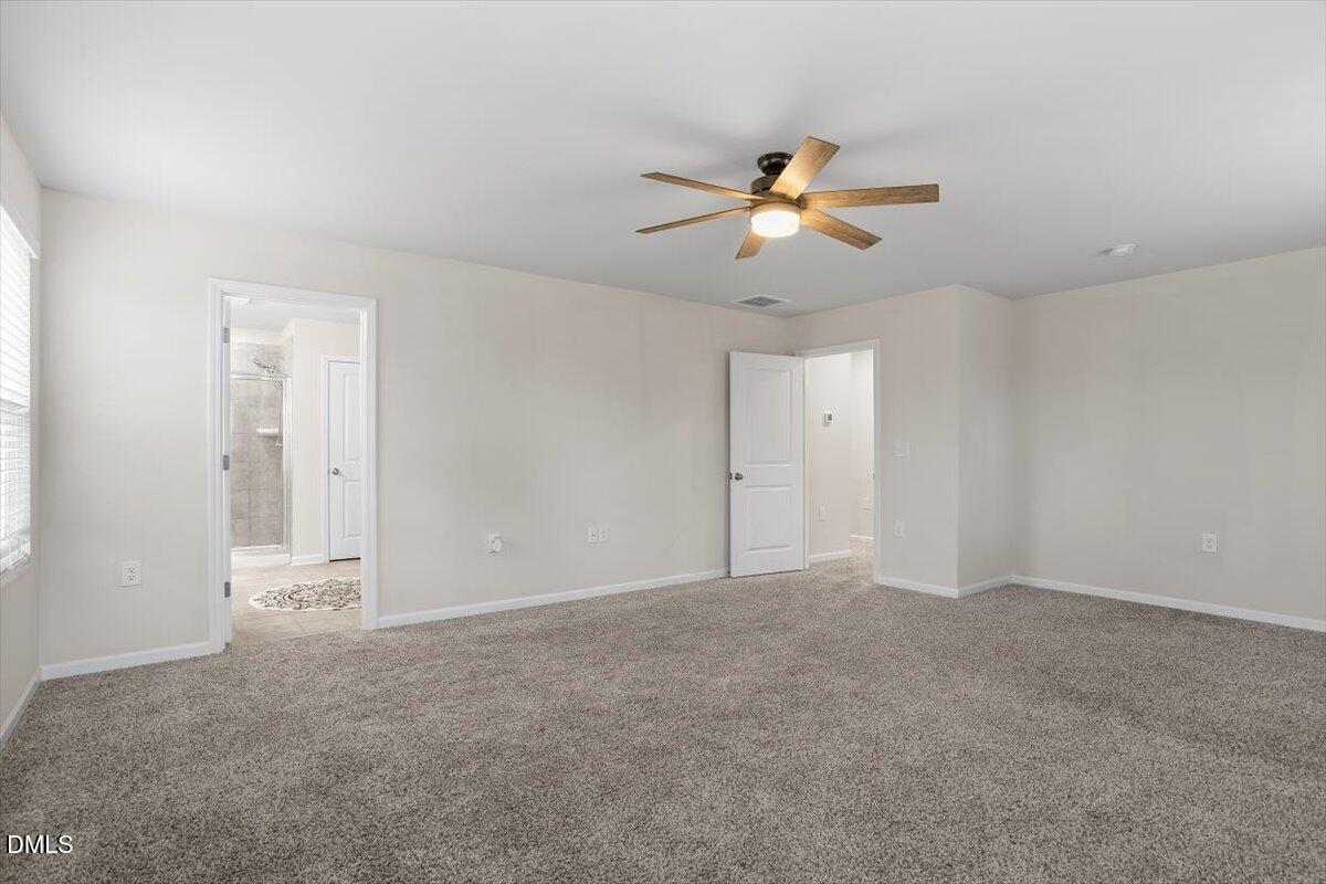 46 Coffee Tree Circle Clayton, NC 27527 - Photo 23 of 36 a view of an empty room