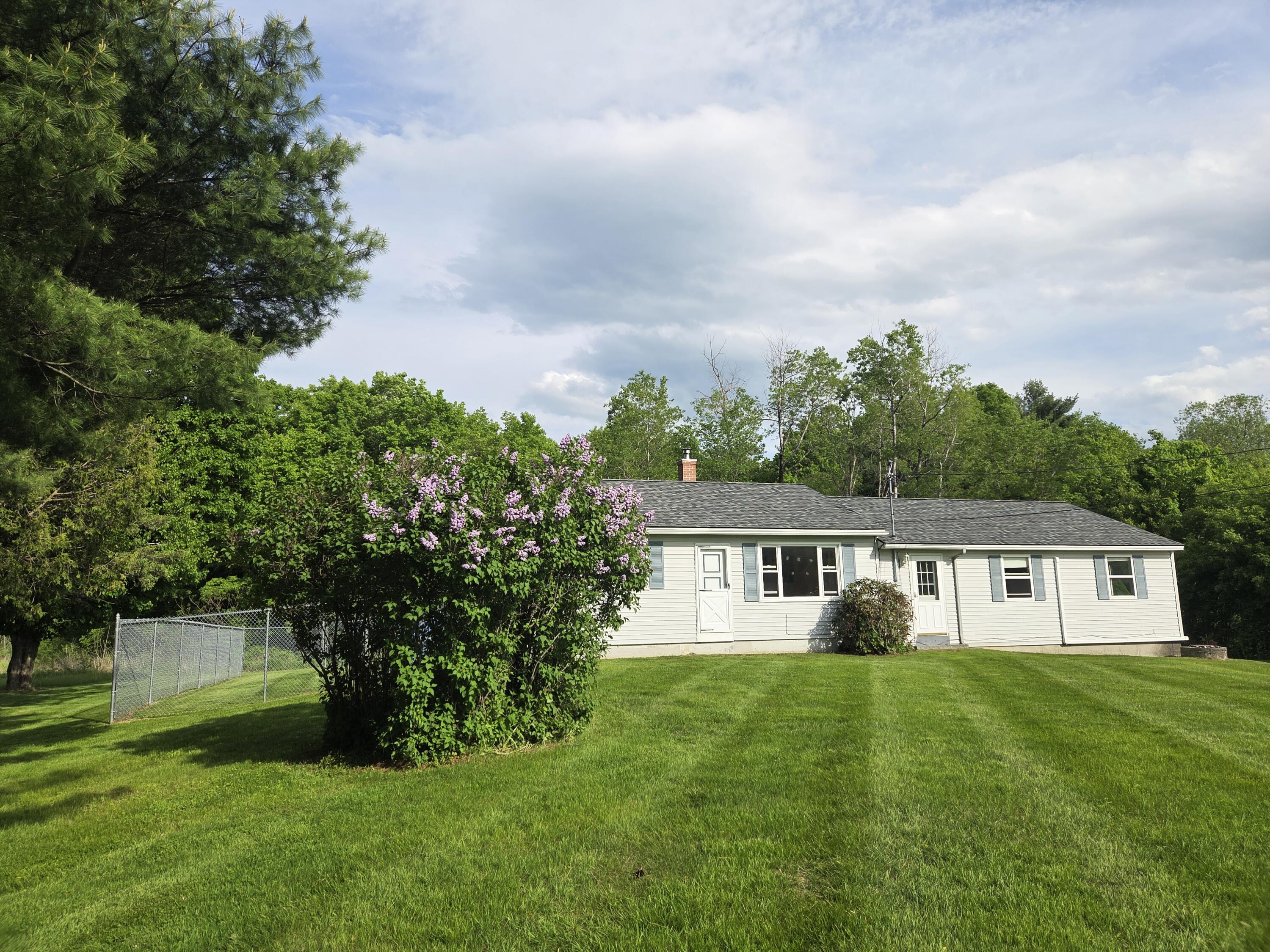 2525 West River Road Sidney, ME 04330 - Photo 37 of 41 Mature lilac trees in the front