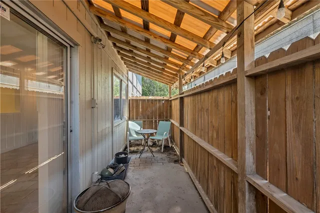 a view of a swimming pool with a patio