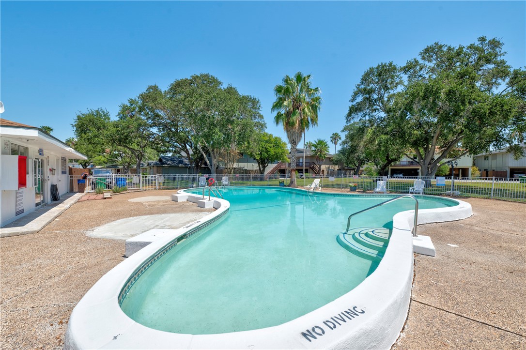 2056 Hidden Lake Corpus Christi, TX 78412 - Photo 23 of 26 a view of a swimming pool with a patio