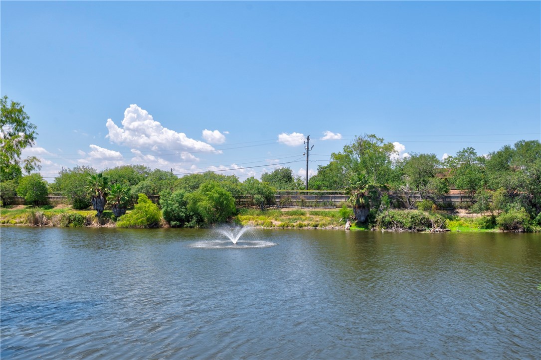 2056 Hidden Lake Corpus Christi, TX 78412 - Photo 25 of 26 a view of a lake with houses in the background