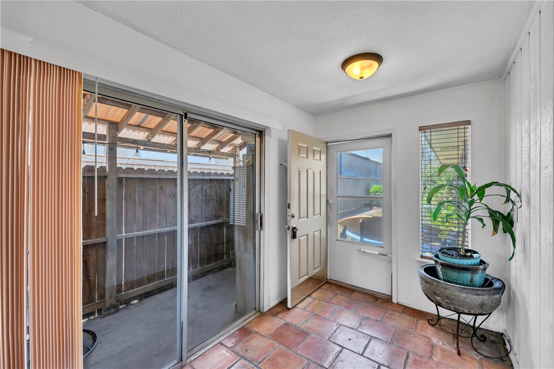 2056 Hidden Lake Corpus Christi, TX 78412 - Photo 4 of 26 a view of a livingroom with furniture and a potted plant