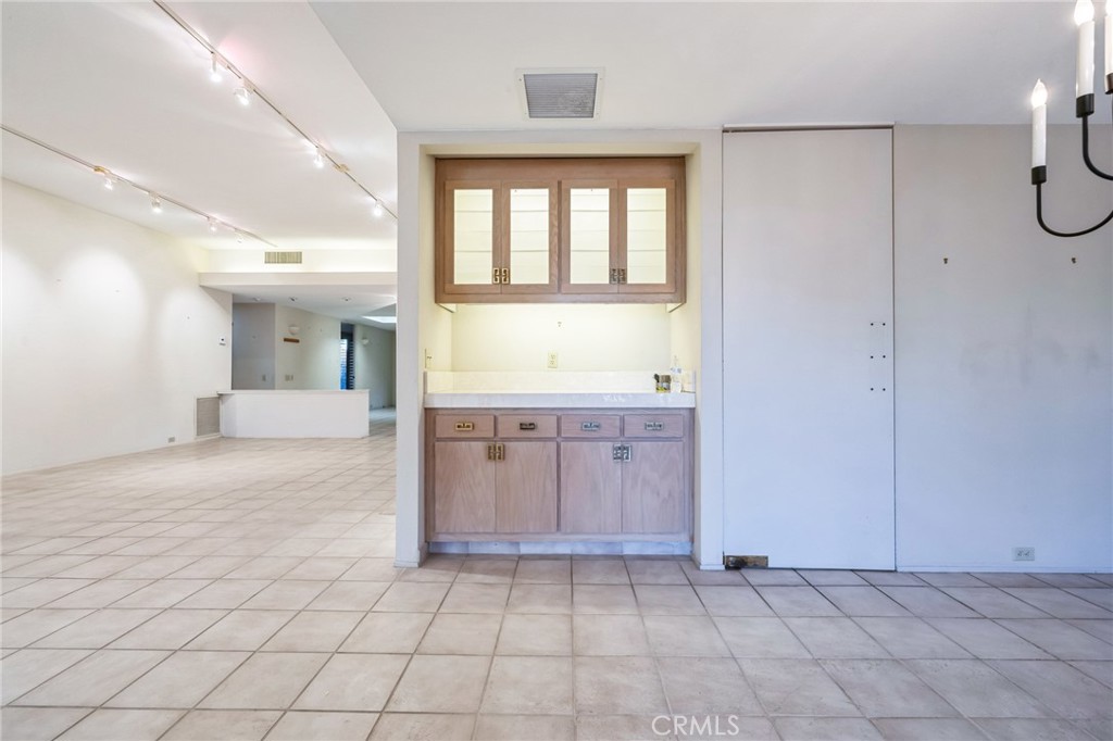 1 Radcliff Court Rancho Mirage, CA 92270 - Photo 13 of 52 a view of a bathroom with a sink and a vanity