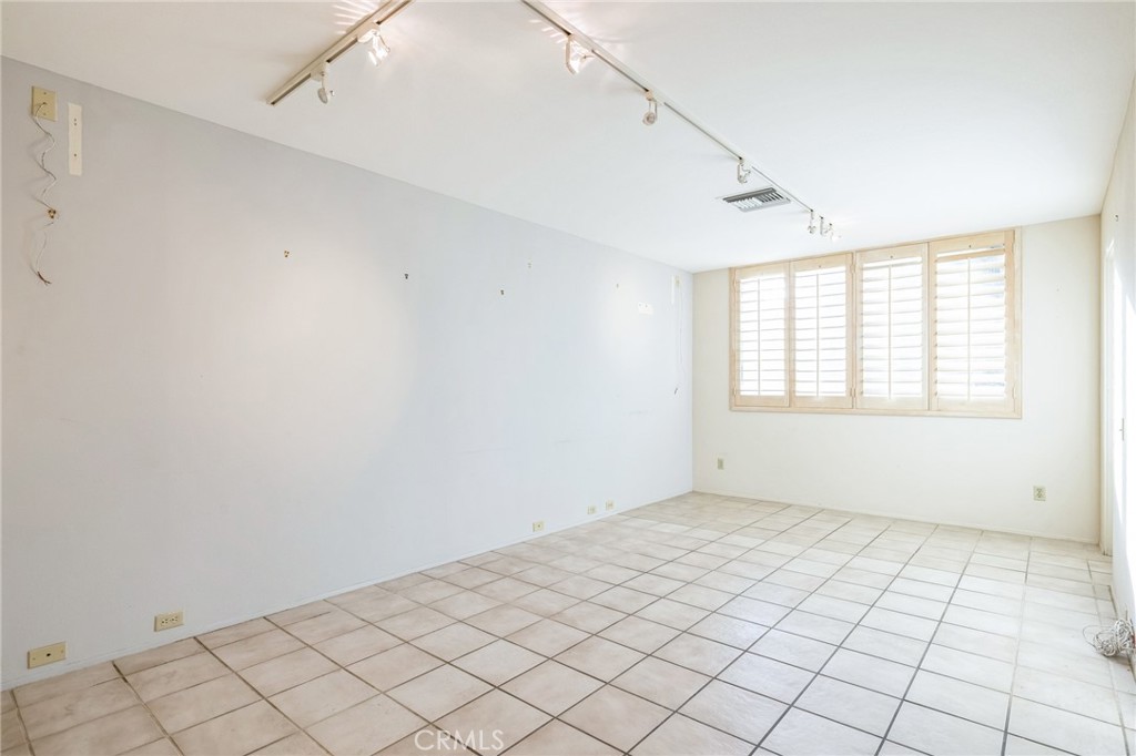 1 Radcliff Court Rancho Mirage, CA 92270 - Photo 26 of 52 a view of an empty room and window