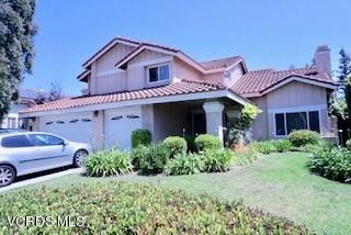 12448 Spring Creek Road Moorpark, CA 93021 - Photo 1 of 19 front view of a house with a garden