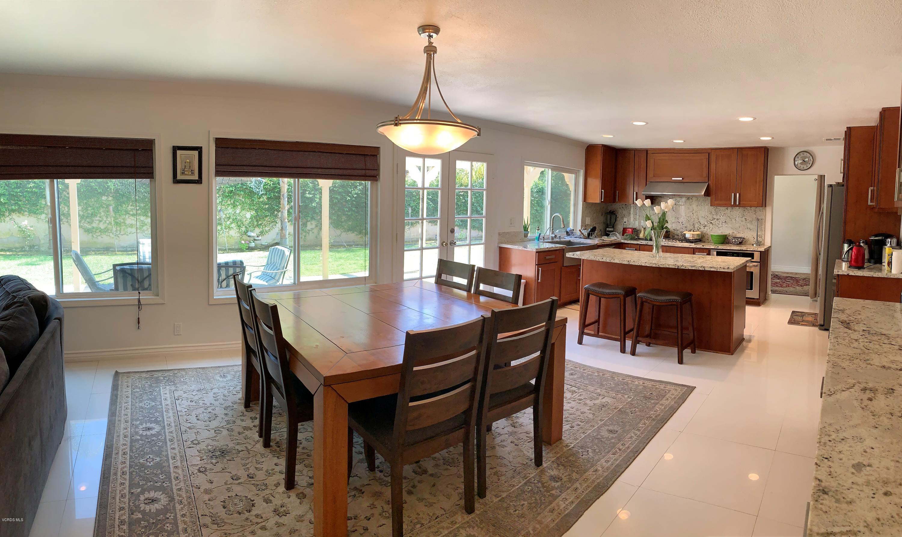 12448 Spring Creek Road Moorpark, CA 93021 - Photo 11 of 19 a view of a dining room with furniture window and outside view