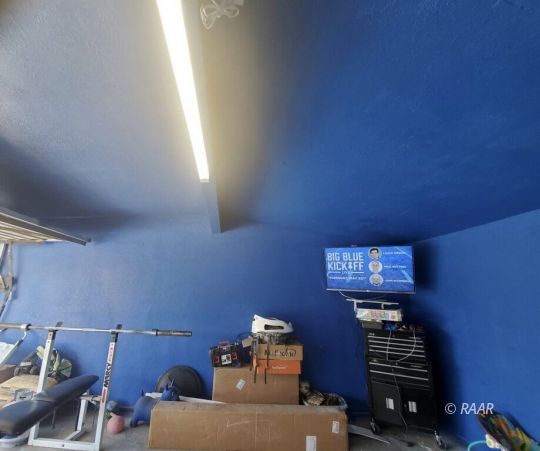 425 North Norma Street Ridgecrest, CA 93555 - Photo 21 of 33 a bedroom with a bed and a window