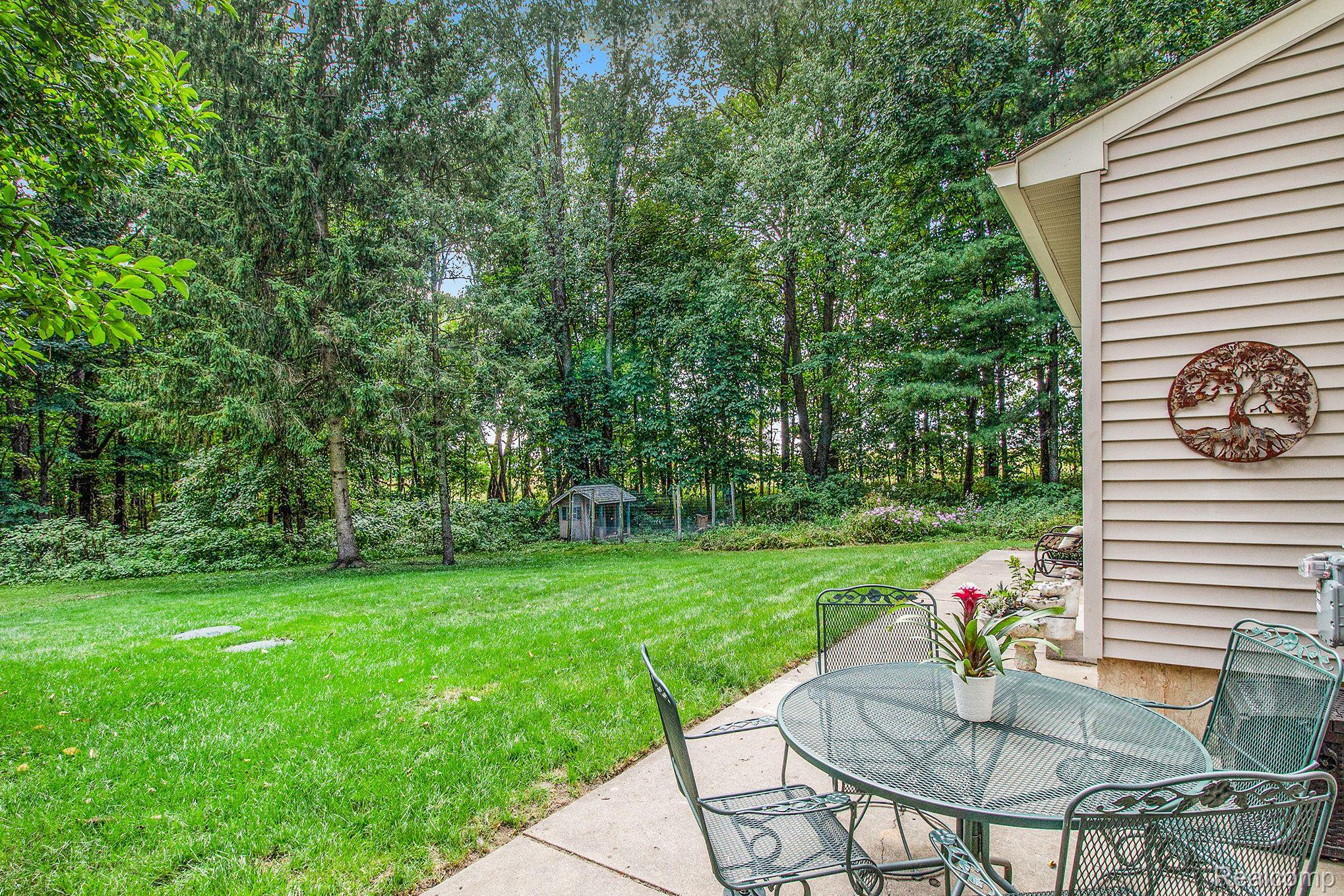 13610 Holtforth Road Fenton, MI 48430 - Photo 25 of 31 Patio Looks Out to Private Backyard