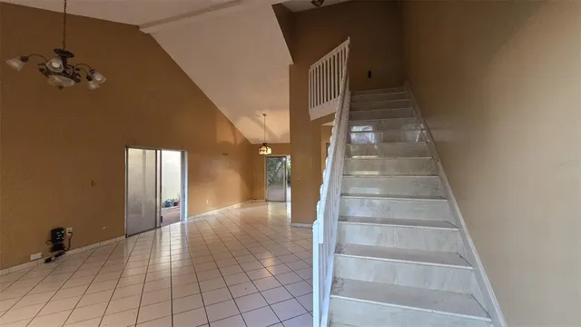a kitchen with a sink and a stove top oven