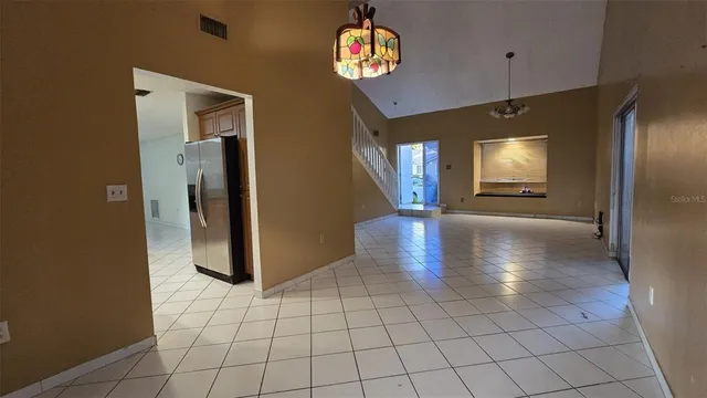 a view interior of a house an entryway and fire place