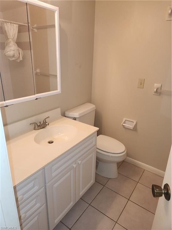 30 Watercolor Way, Unit 30 Naples, FL 34113 - Photo 8 of 9 Full bath with vanity and tile patterned flooring