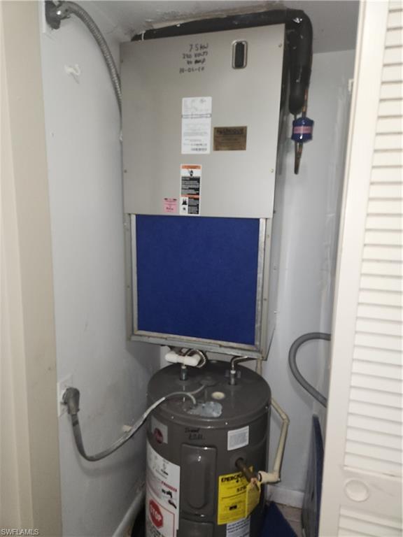 30 Watercolor Way, Unit 30 Naples, FL 34113 - Photo 9 of 9 Utility room with water heater