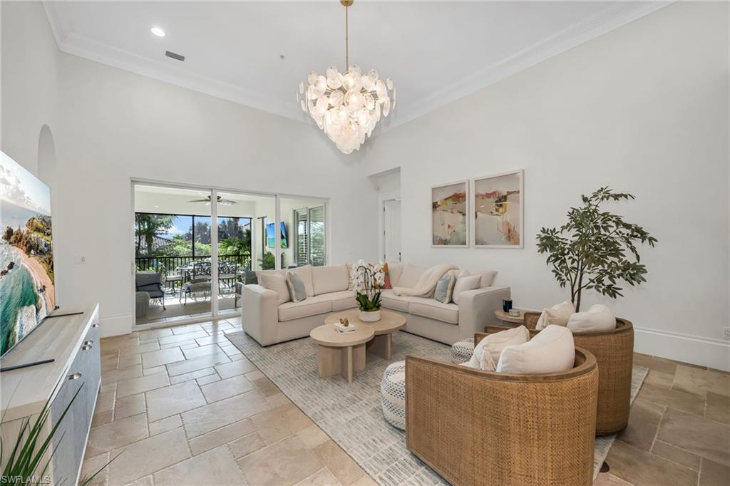 Welcome to this move-in ready, thoughtfully-updated coach home in Grey Oaks!