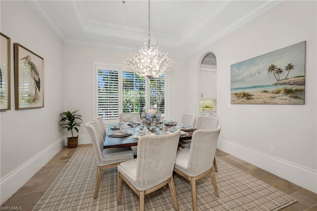 2323 Tradition Way, Unit 201 Naples, FL 34105 - Photo 9 of 48 You will have plenty of room to entertain your family and friends, with this expansive dining room right off the kitchen and living room.
