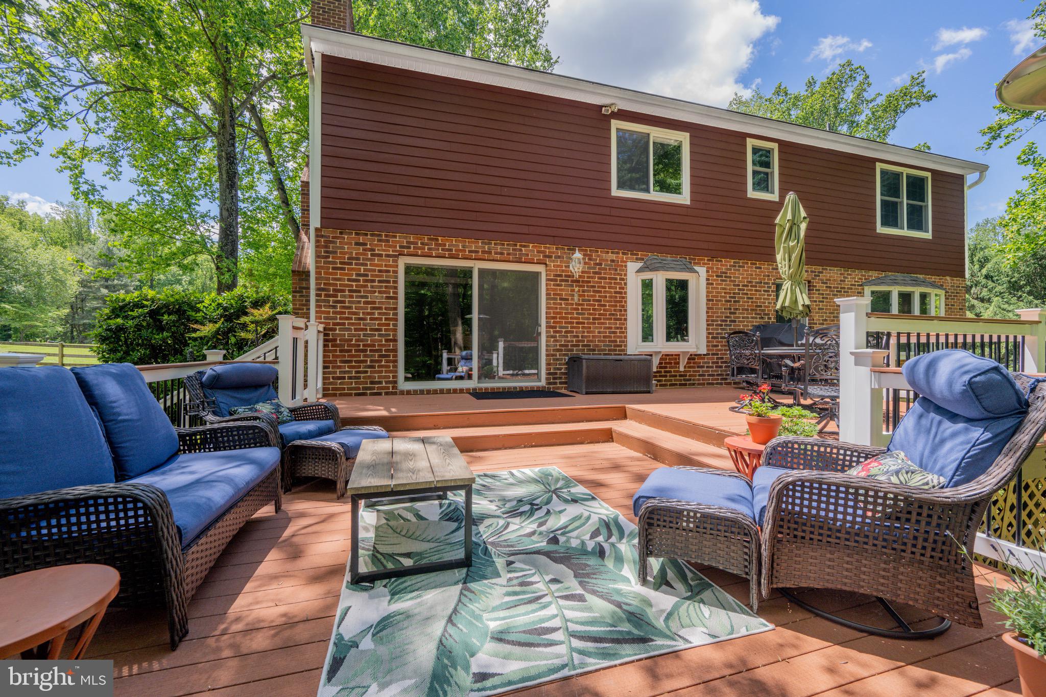2 Wetherbee Court Phoenix, MD 21131 - Photo 13 of 19 a outdoor living space with patio furniture and a fireplace