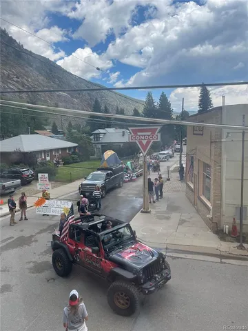 a view of street with sitting area